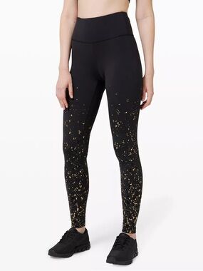 Lululemon• High-Waist Black Leggings with Gold Foil Accent